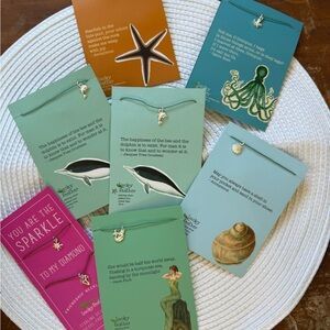 Bundle of  Charm Necklace on thread with clasp. Lucky Feather